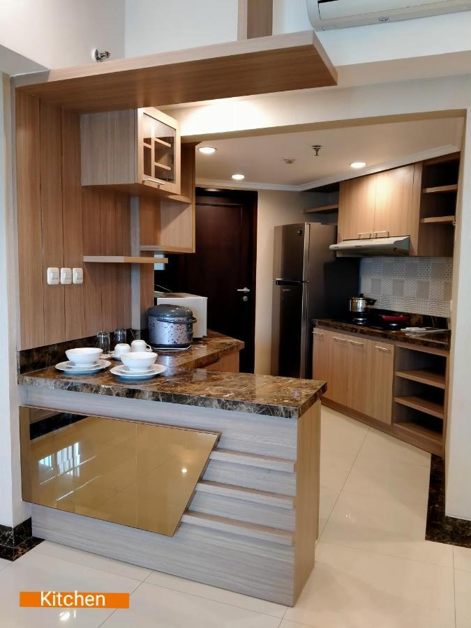 Apartemen Puncak Marina Surabaya Esterno foto