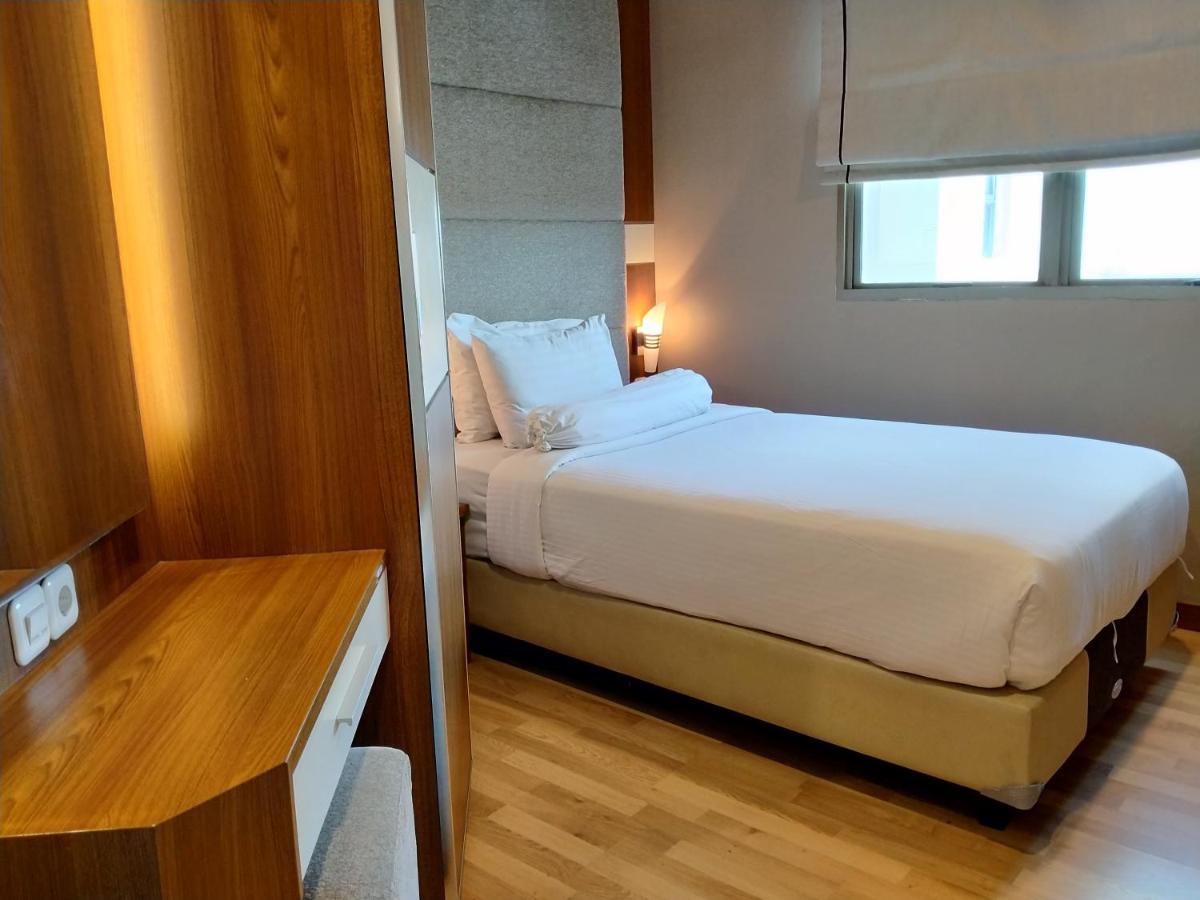 Apartemen Puncak Marina Surabaya Esterno foto